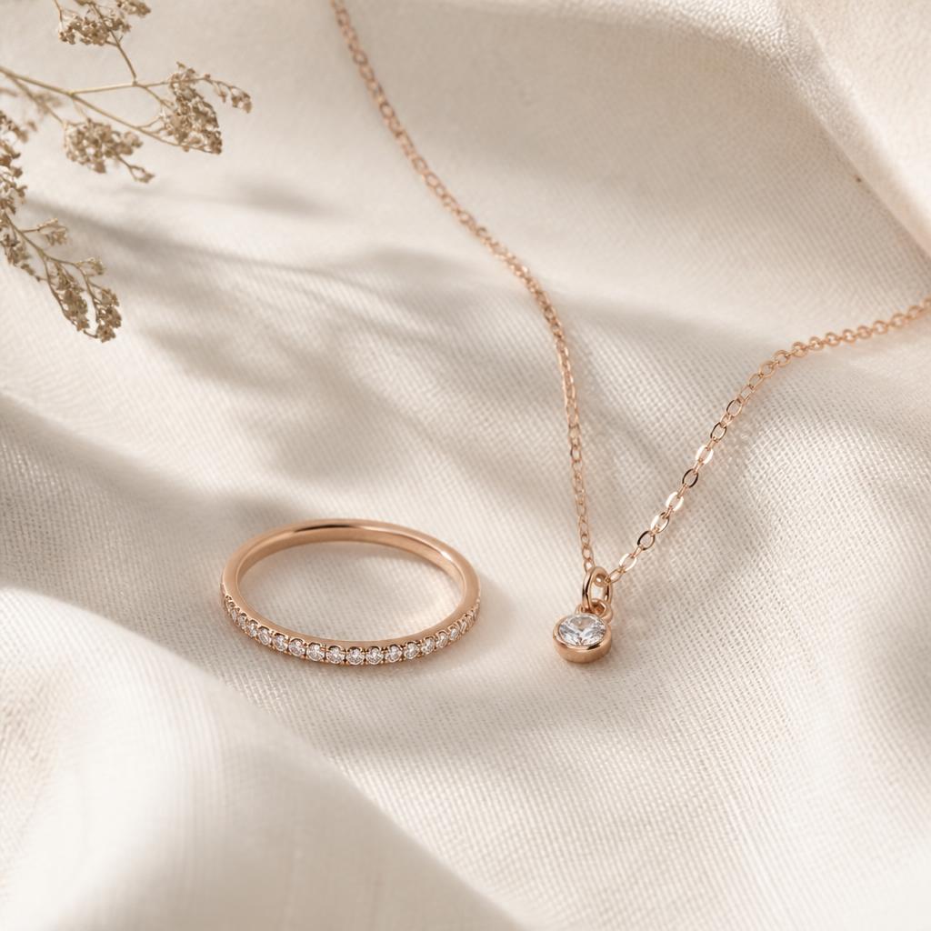 Delicate rose gold band ring and matching dainty necklace